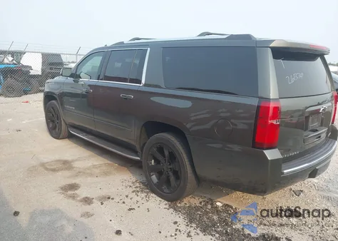 2019 Chevrolet Suburban Premier z USA, uszkodzony, nr VIN 1GNSKJKC9KR261374